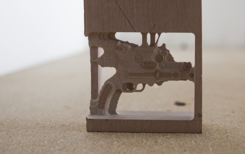 Træfigur som en del af træblok i laboratoriet for 3D